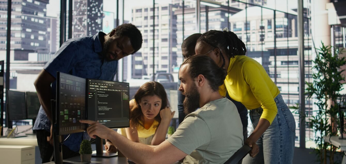 Team of software engineers doing brainstorming in office cto as a service for startups
